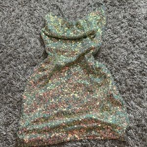 multicolored sequins (reflects teal)
